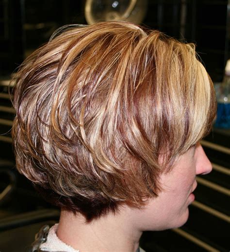 Chop down the strands to ear length. . Layered short bob hairstyles